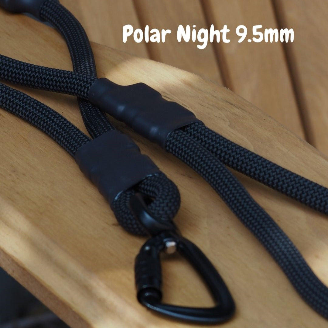 Polar Night Black 9.5mm climbing rope dog leash by North Tail — handmade in Ontario with genuine UIAA certified rope and a swivel auto-locking carabiner. Durable, strong, and designed for active dogs and outdoor adventures.