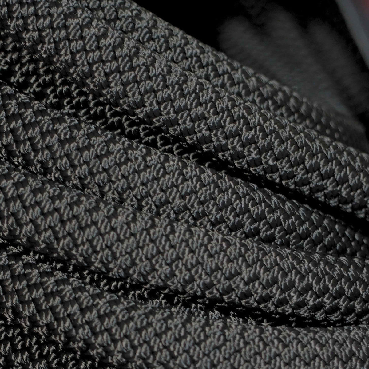 Polar Night Black 9.5mm climbing rope dog leash by North Tail — handmade in Ontario with genuine UIAA certified rope and a swivel auto-locking carabiner. Durable, strong, and designed for active dogs and outdoor adventures.