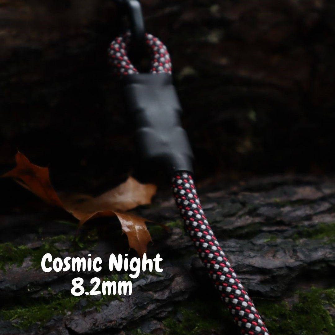 Cosmic Night 8.2mm climbing rope dog leash by North Tail — handmade in Ontario with genuine UIAA certified rope and a swivel auto-locking carabiner. Durable and eye-catching leash designed for active dogs and outdoor adventures.