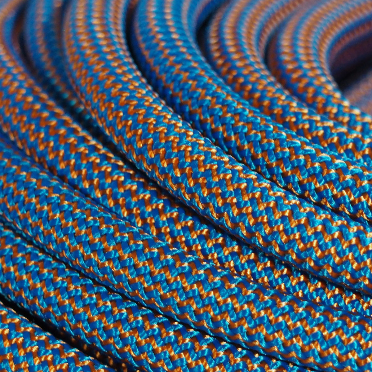 Stellar 8.5mm climbing rope dog leash by North Tail — handmade in Ontario using genuine UIAA certified rope in Blue and Orange. Durable and designed for active dogs and outdoor adventures.