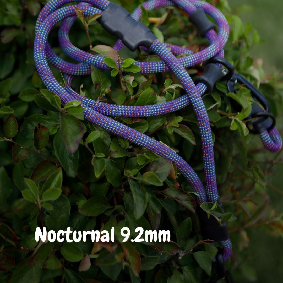 Nocturnal 9.2mm climbing rope hands-free dog leash with adjustable length and traffic handle by North Tail — handmade in Ontario with genuine UIAA certified rope and a swivel auto-locking carabiner. Durable, secure, and perfect for active dogs and outdoor adventures.
