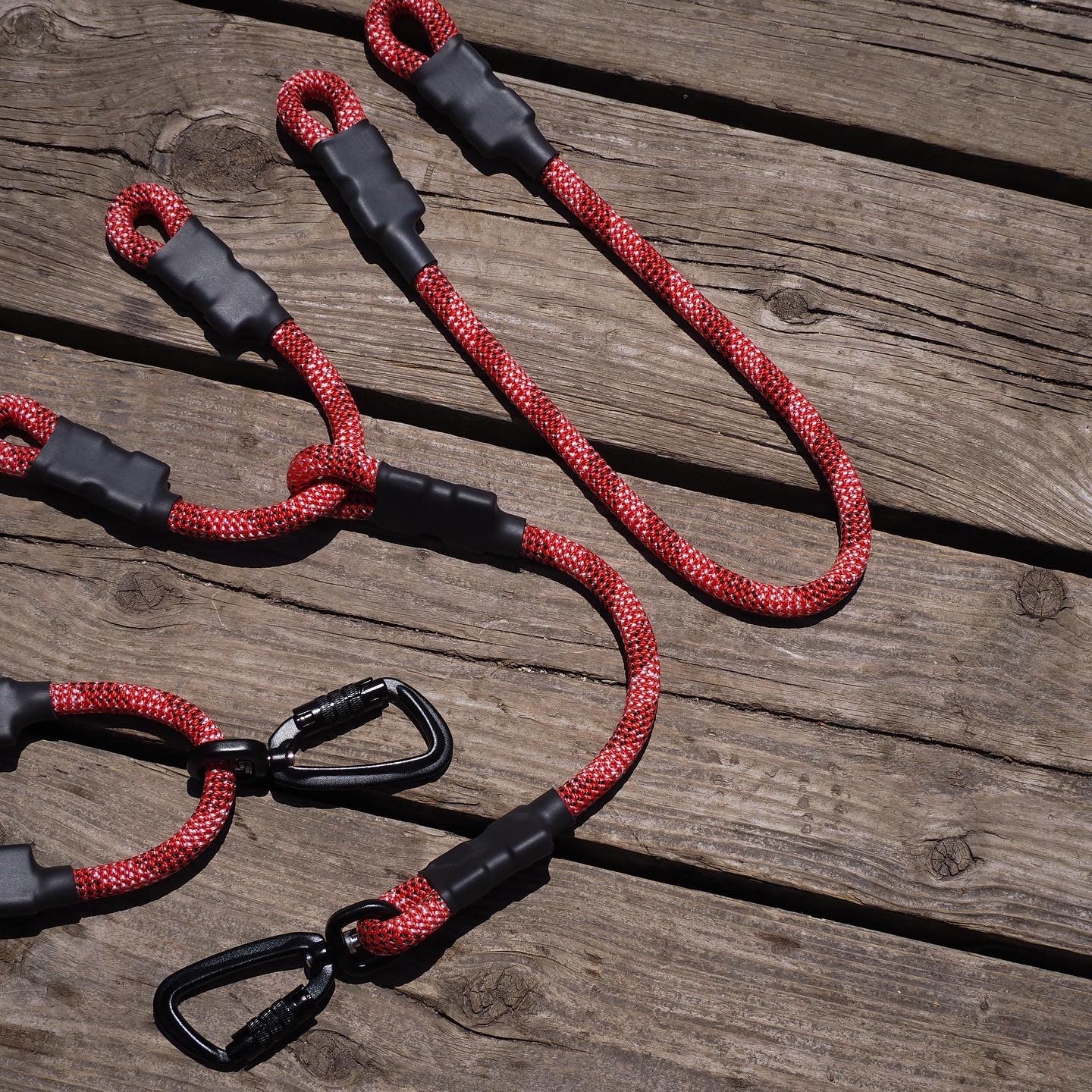 Climbing rope car headrest attachment, looped securely around metal headrest poles inside a vehicle, showcasing a minimalist and functional design.