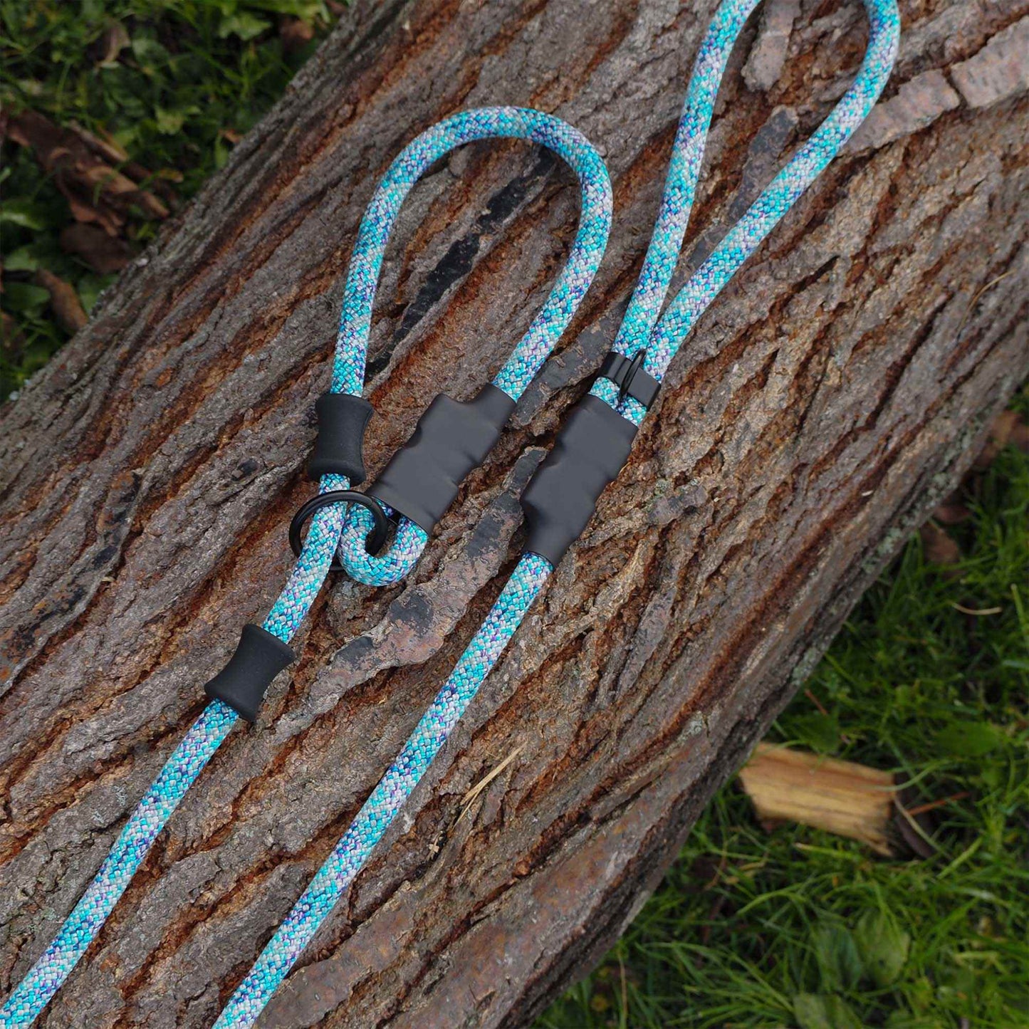Close-up of the light blue NT Slip Lead showing the textured climbing rope and two durable rubber stoppers.