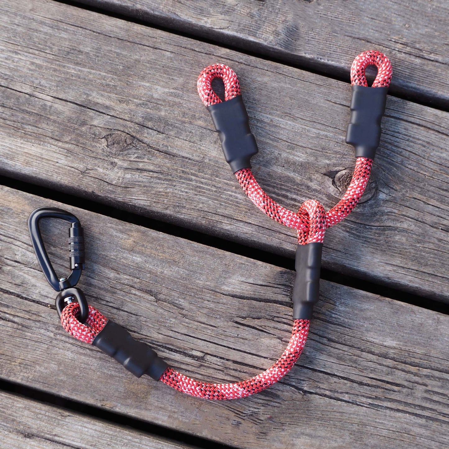 Climbing rope car headrest attachment, looped securely around metal headrest poles inside a vehicle, showcasing a minimalist and functional design.